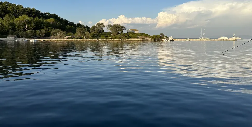 Scenic view of Gaios village in Paxos, showcasing its colorful Venetian architecture and picturesque harbor.